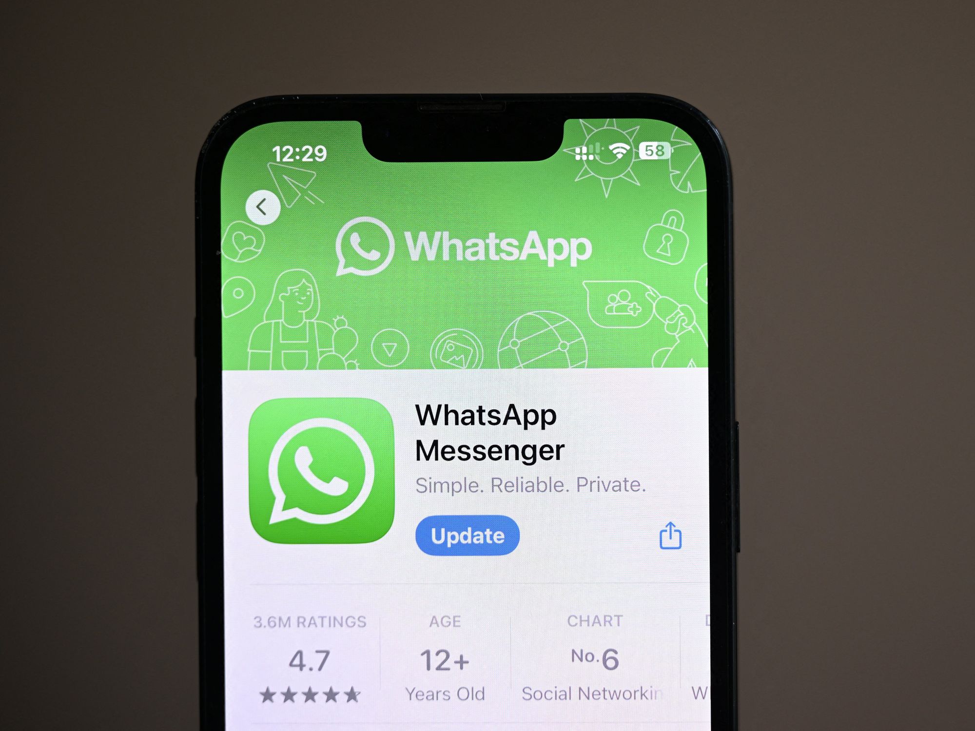 whatsapp listing in the apple app store with an update button