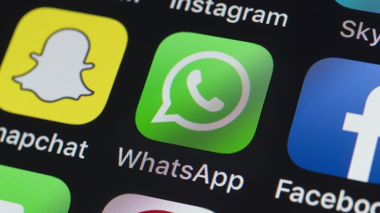 WhatsApp logo on mobile screen