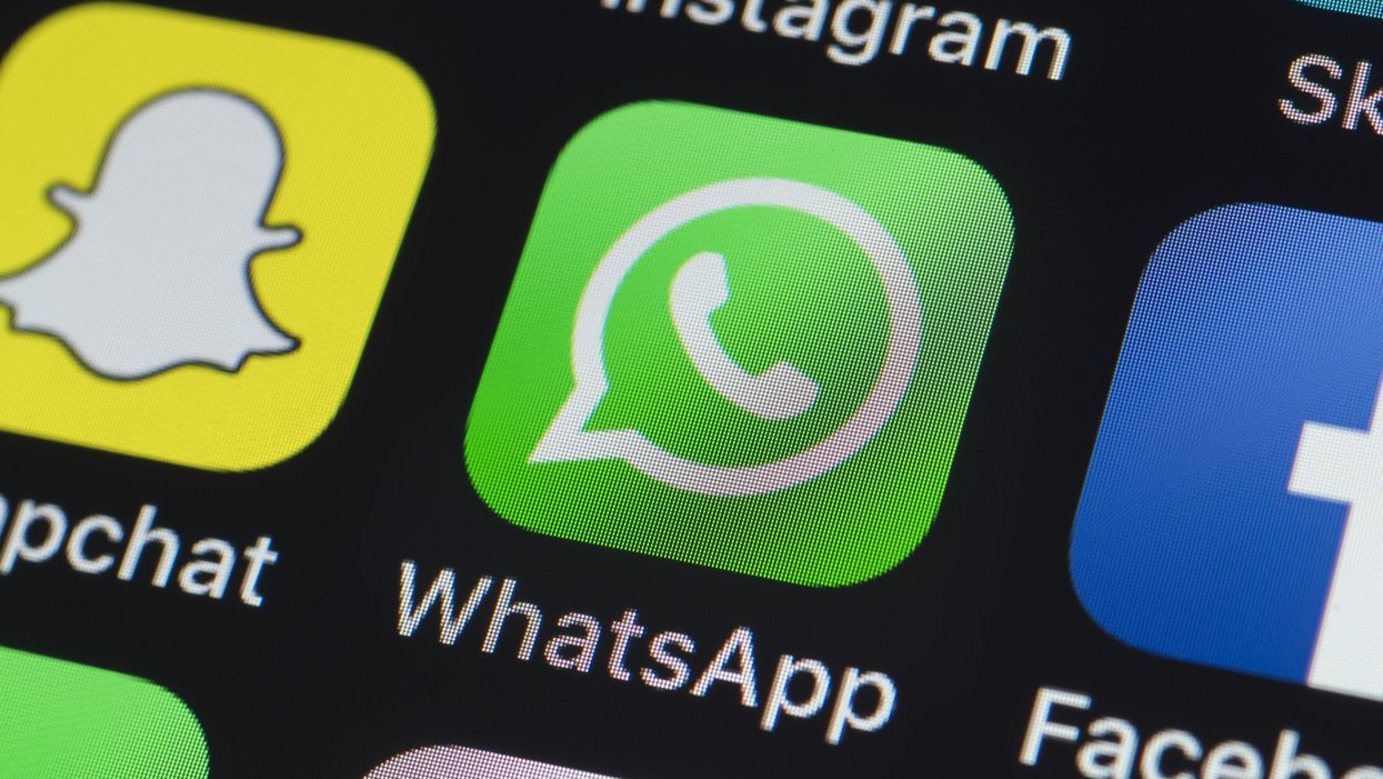 WhatsApp logo on mobile screen