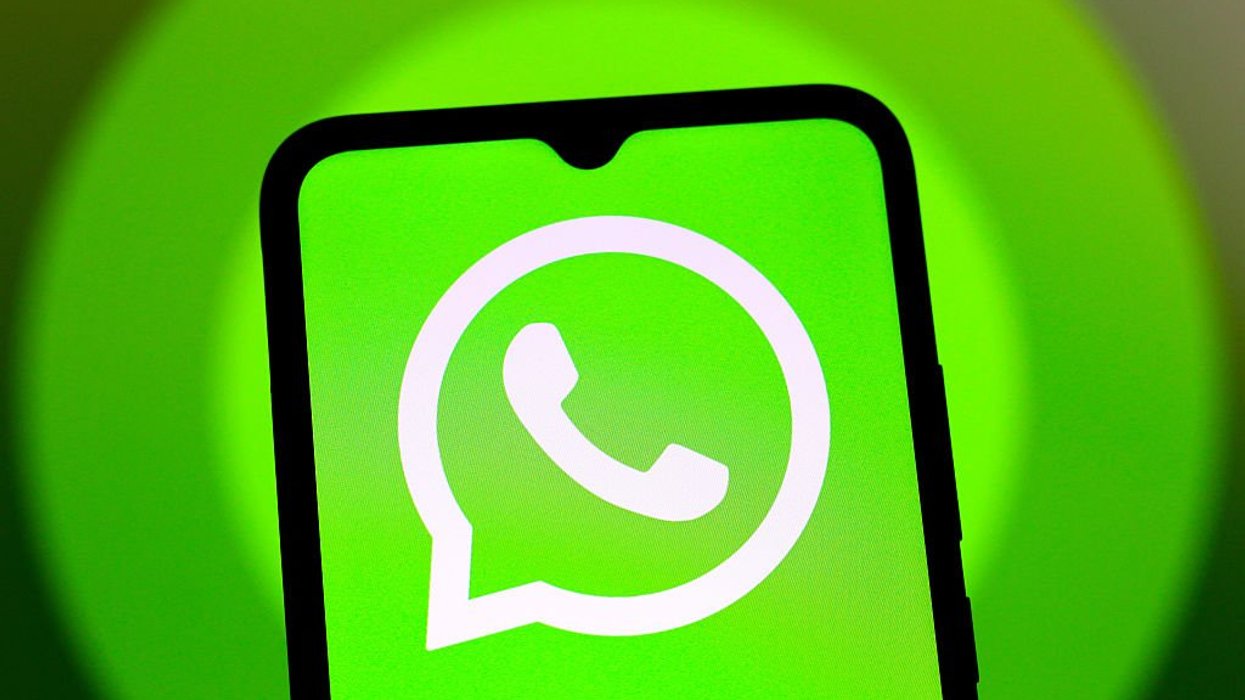 WhatsApp logo on mobile