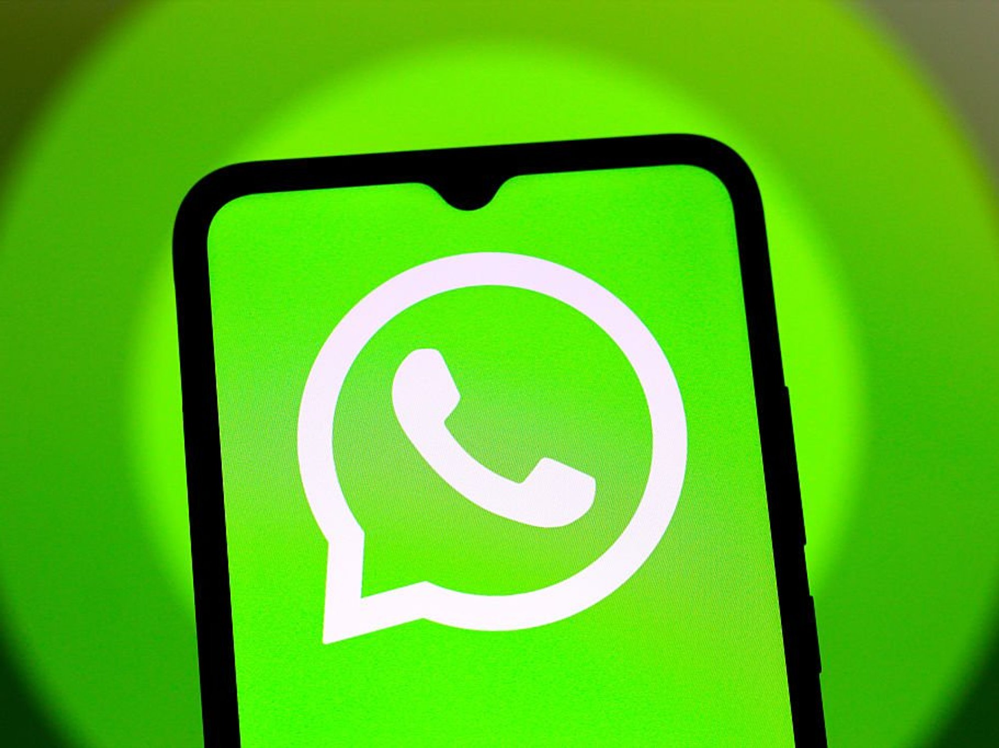 WhatsApp logo on mobile