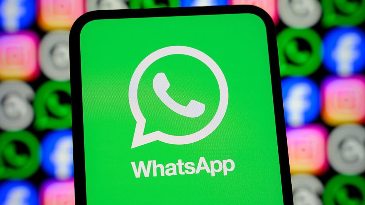 WhatsApp logo on phone