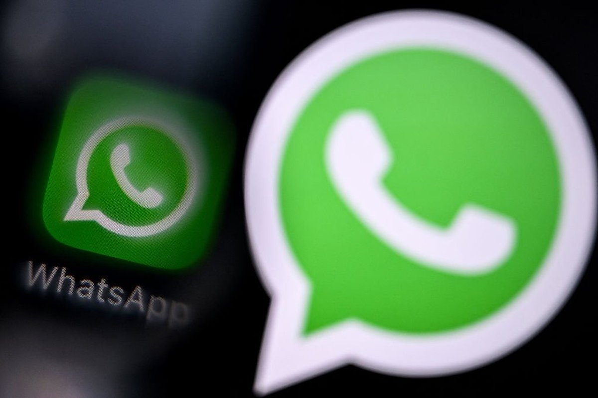 WhatsApp logo pictured next to a larger version of the same logo