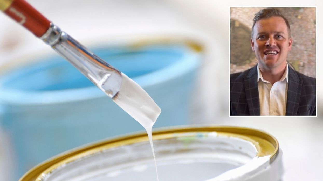 White paint and brush / Corey Adamson