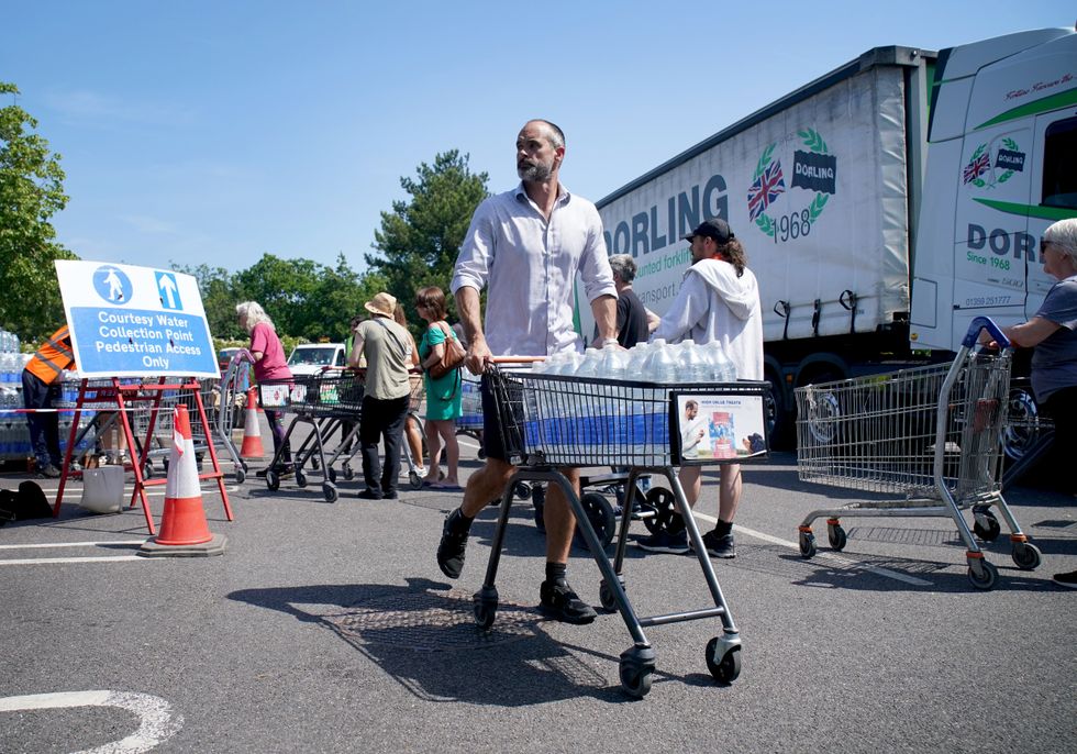 Whitstable, Kent, bottled water being handed out