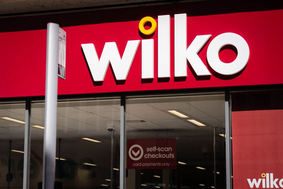 Wilko logo outside store on high street