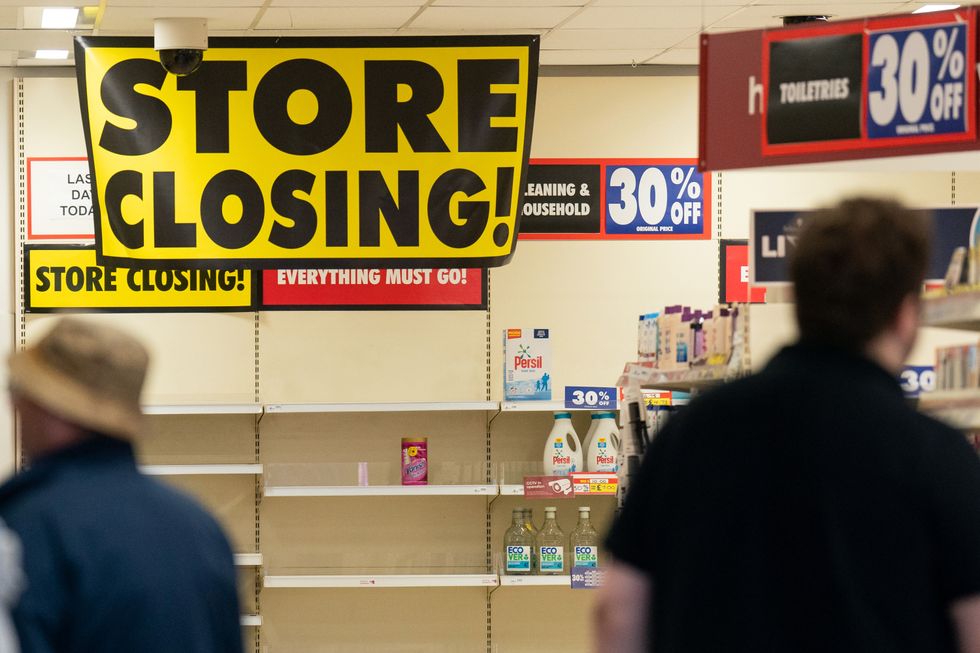 Wilko store closing sign and empty shelves in the store