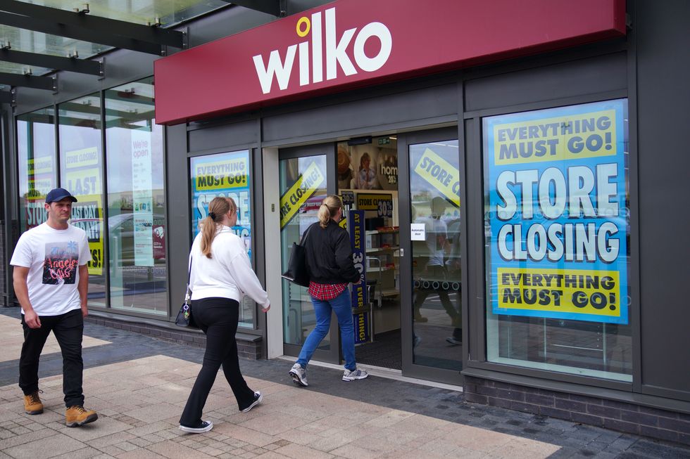 Wilko store front with closing down sale signs