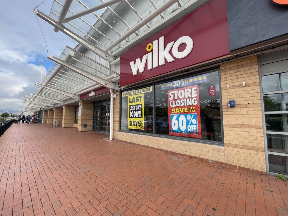 Wilko store with store closing sale sign in window