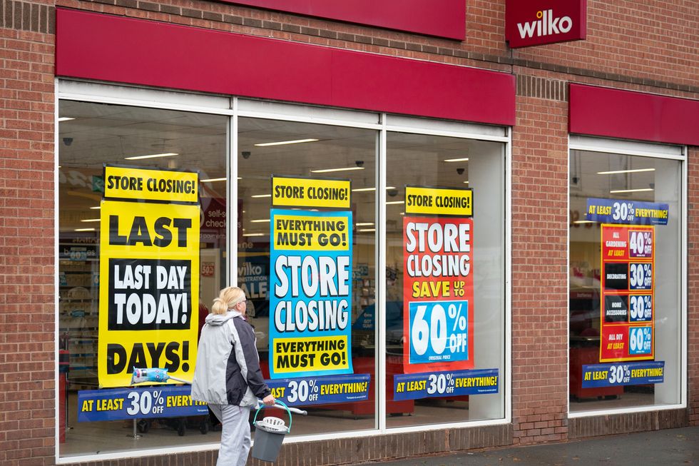 Wilko store with store closing sale sign in window