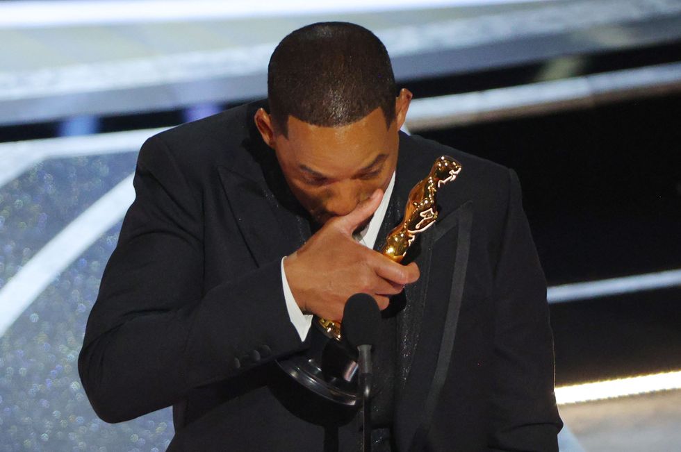 Will Smith accepts the Oscar for Best Actor in %22King Richard%22 at the 94th Academy Awards in Hollywood, Los Angeles, California, U.S., March 27, 2022. REUTERS/Brian Snyder