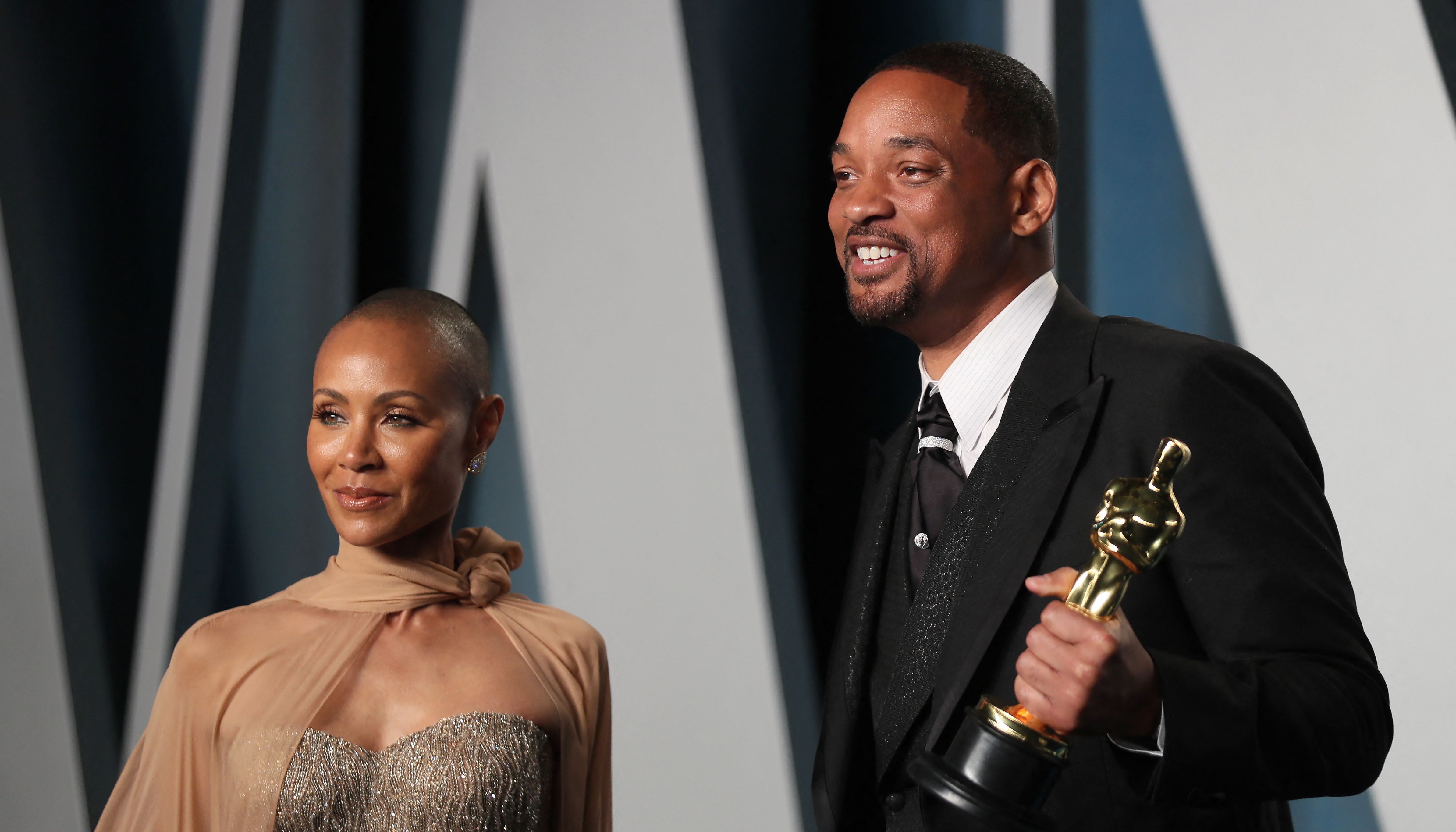 Will Smith and Jada Pinkett Smith arrive at the Vanity Fair Oscar party during the 94th Academy Awards in Beverly Hills, California.