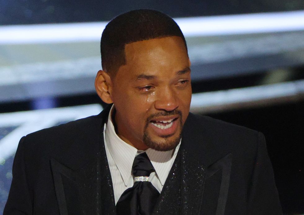 Will Smith cries as he accepts the Oscar for Best Actor in %22King Richard%22 at the 94th Academy Awards in Hollywood, Los Angeles, California, U.S., March 27, 2022. REUTERS/Brian Snyder