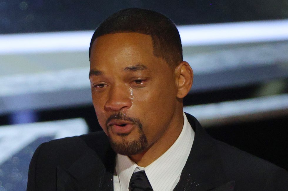 Will Smith cries as he accepts the Oscar for Best Actor