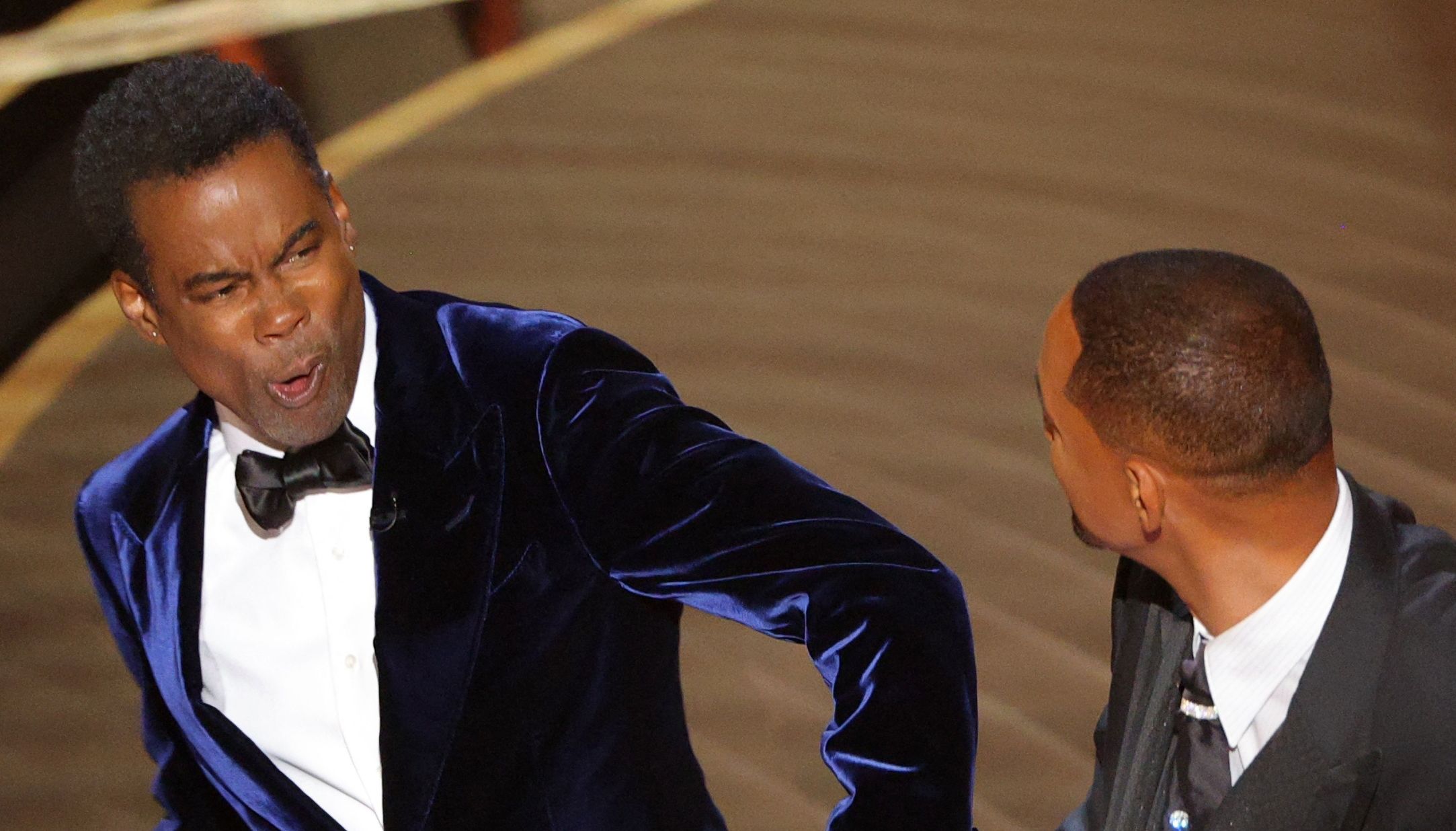 Will Smith hits Chris Rock as Rock spoke on stage during the 94th Academy Awards in Hollywood, Los Angeles, California