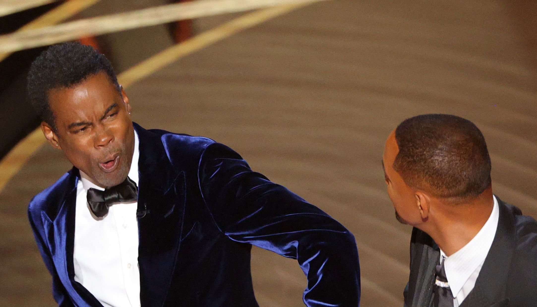 Will Smith (R) hits Chris Rock at last weekend's Oscars