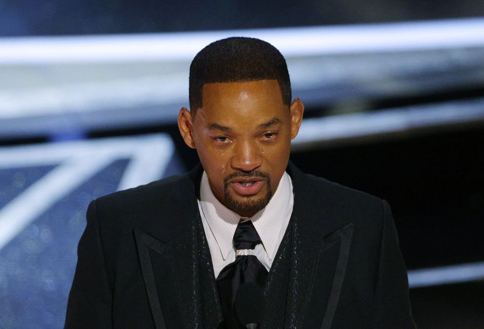Will Smith wins the Oscar for Best Actor in %22King Richard%22 at the 94th Academy Awards in Hollywood, Los Angeles, California, U.S., March 27, 2022. REUTERS/Brian Snyder