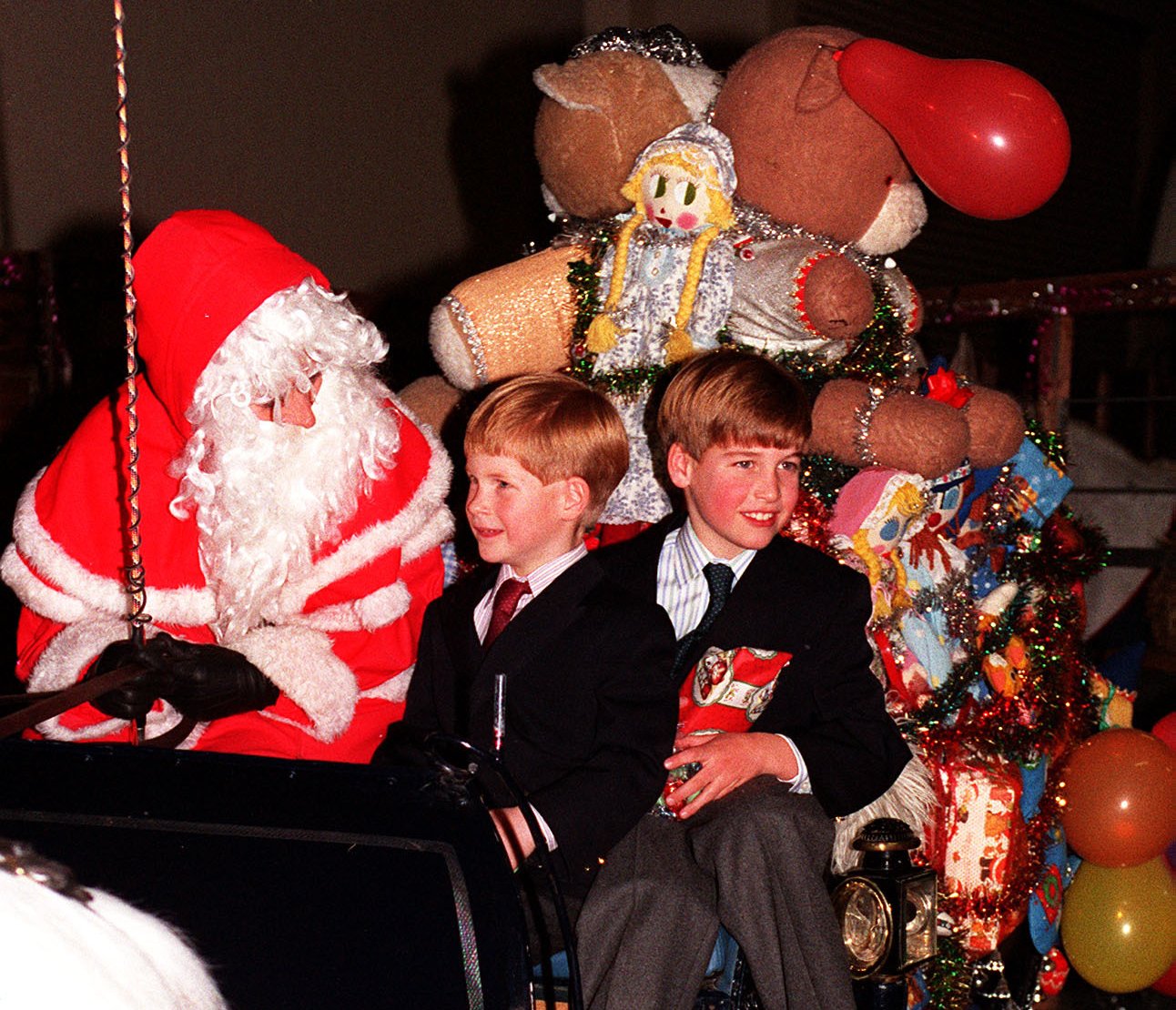 William and Harry pictured meeting Father Christmas in 1990