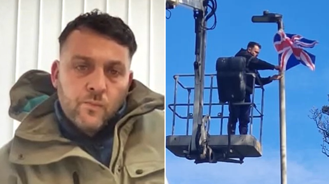 William Haylett; William Haylett tying flag to street light