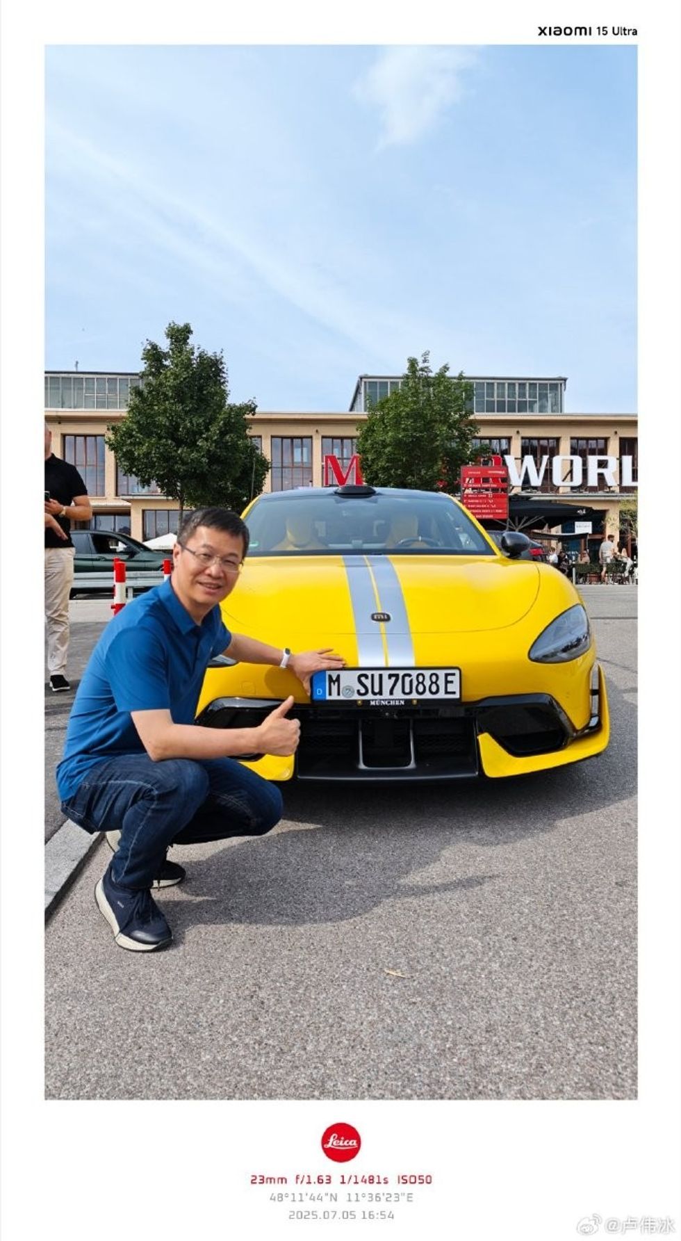 William Lu posing with the Xiaomi SU7 in Munich