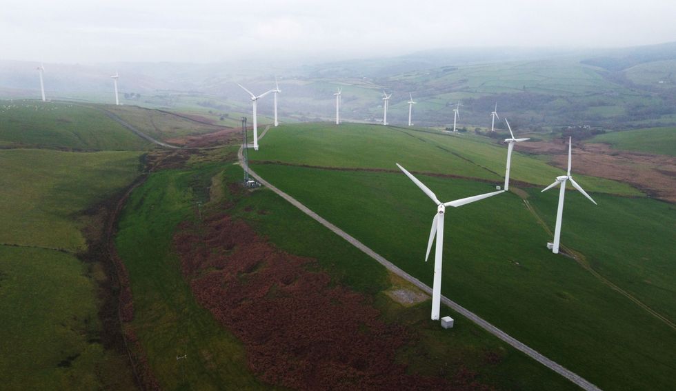 Wind turbines are seen at Mynydd Portref Wind Farm near Hendreforgan in South Wales.