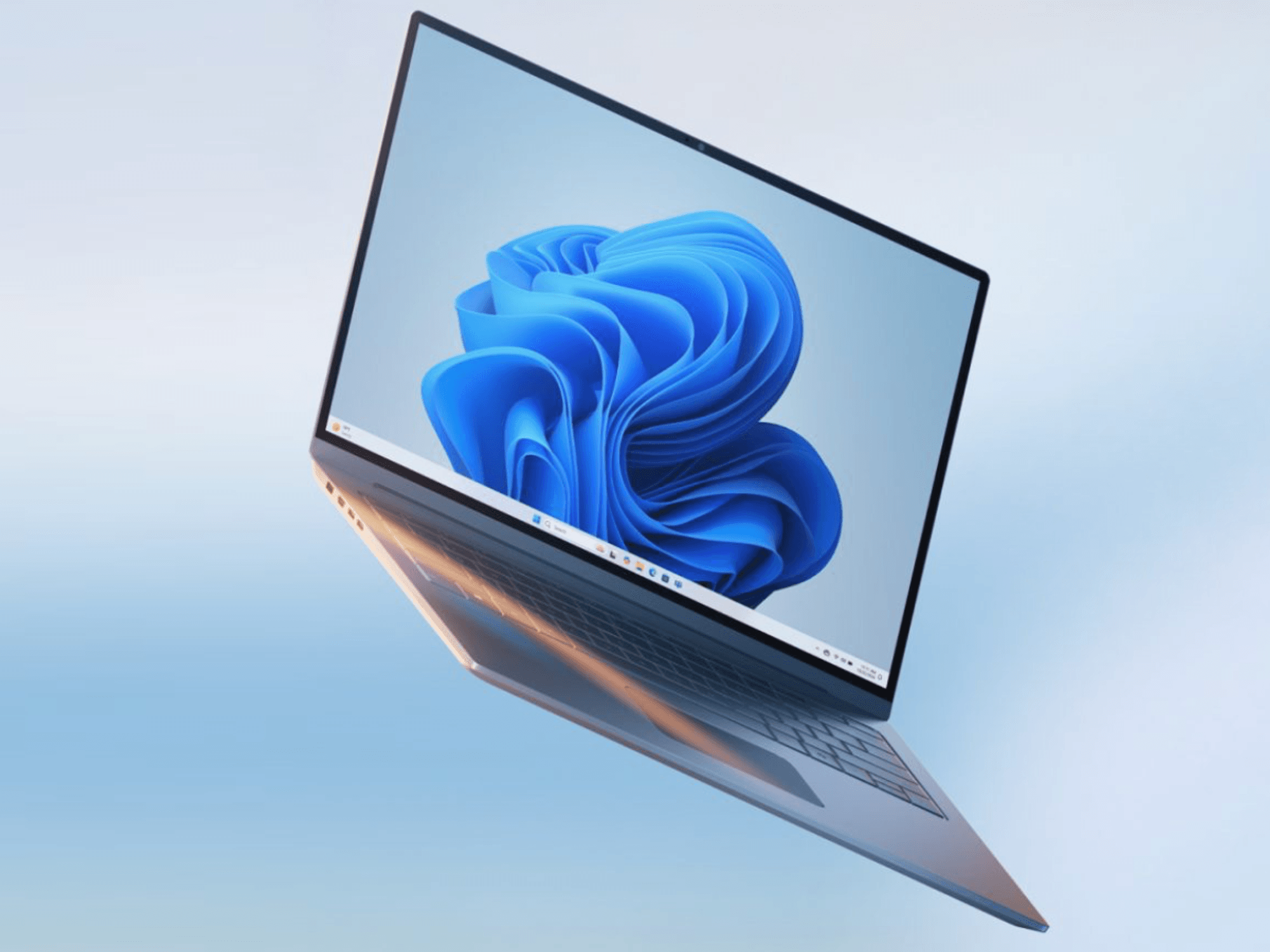 Windows 11 laptop pictured on a light blue background