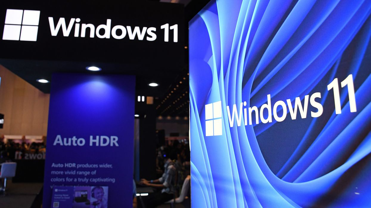 Windows 11 launch event with posters showcasing new features in the operating system