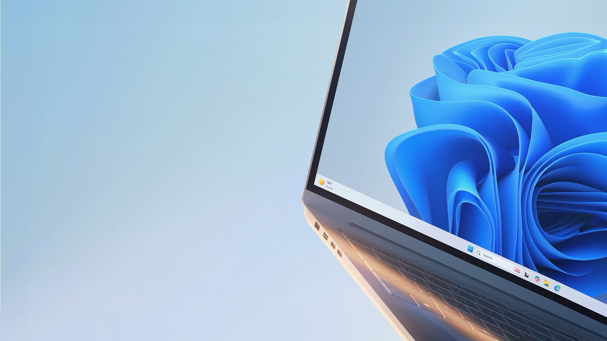 windows 11 wallpaper shown on a laptop PC