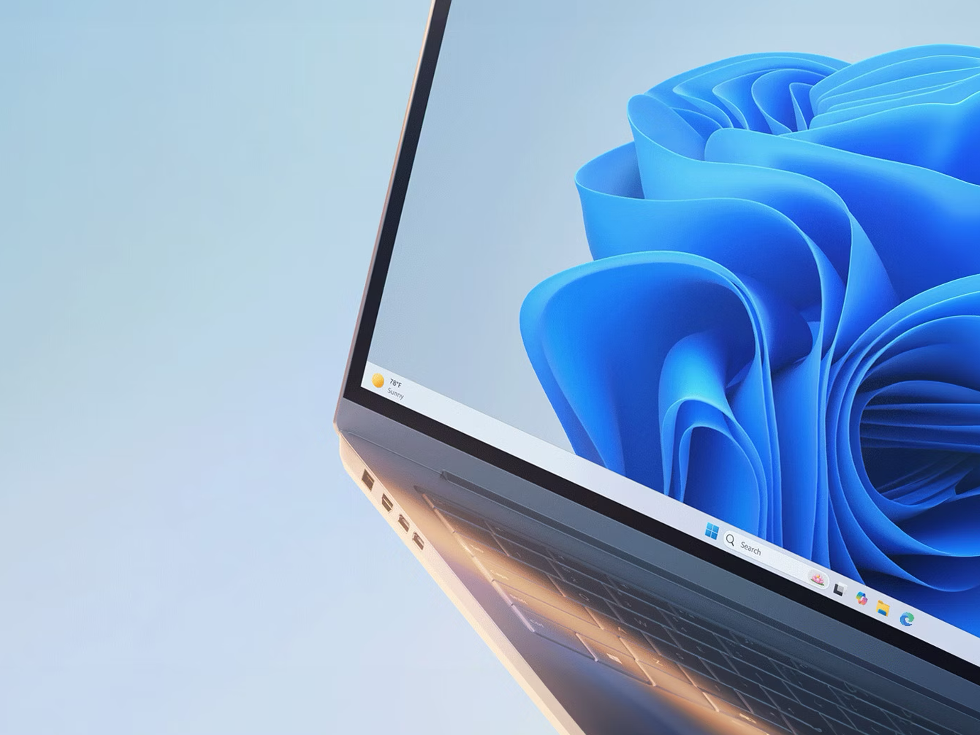 windows 11 wallpaper shown on a laptop PC