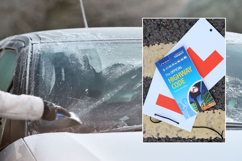 Windscreen covered in frost and a copy of the Highway Code