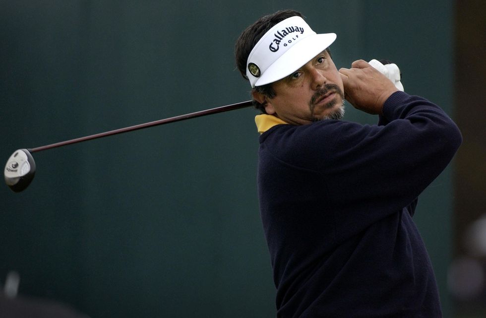 Winner of this year's Scottish Open Eduardo Romero tees off for a practice round at the Open Golf Championship at Muirfield in Scotland.