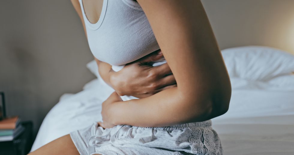 WOMAN ABDOMINAL PAIN