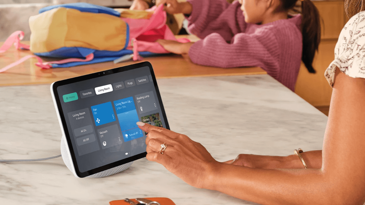 Woman adjusting settings on Amazon Echo Show 8