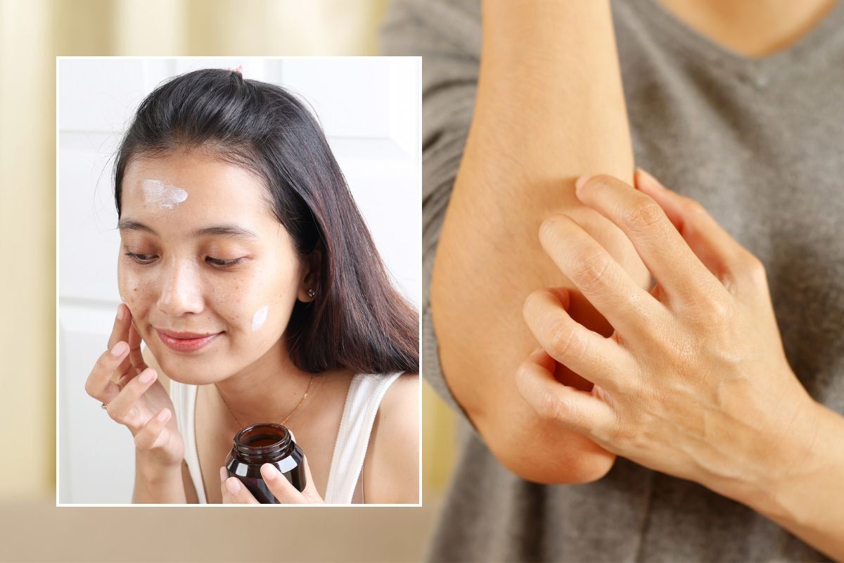 Woman applying moisturiser to her face
