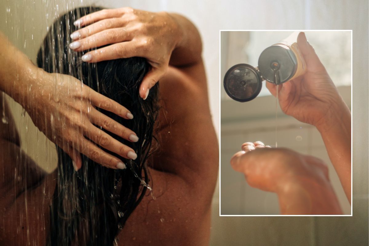 woman applying shampoo to hair