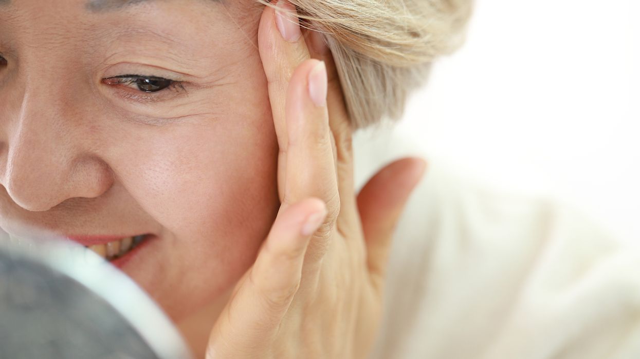 woman applying skin care