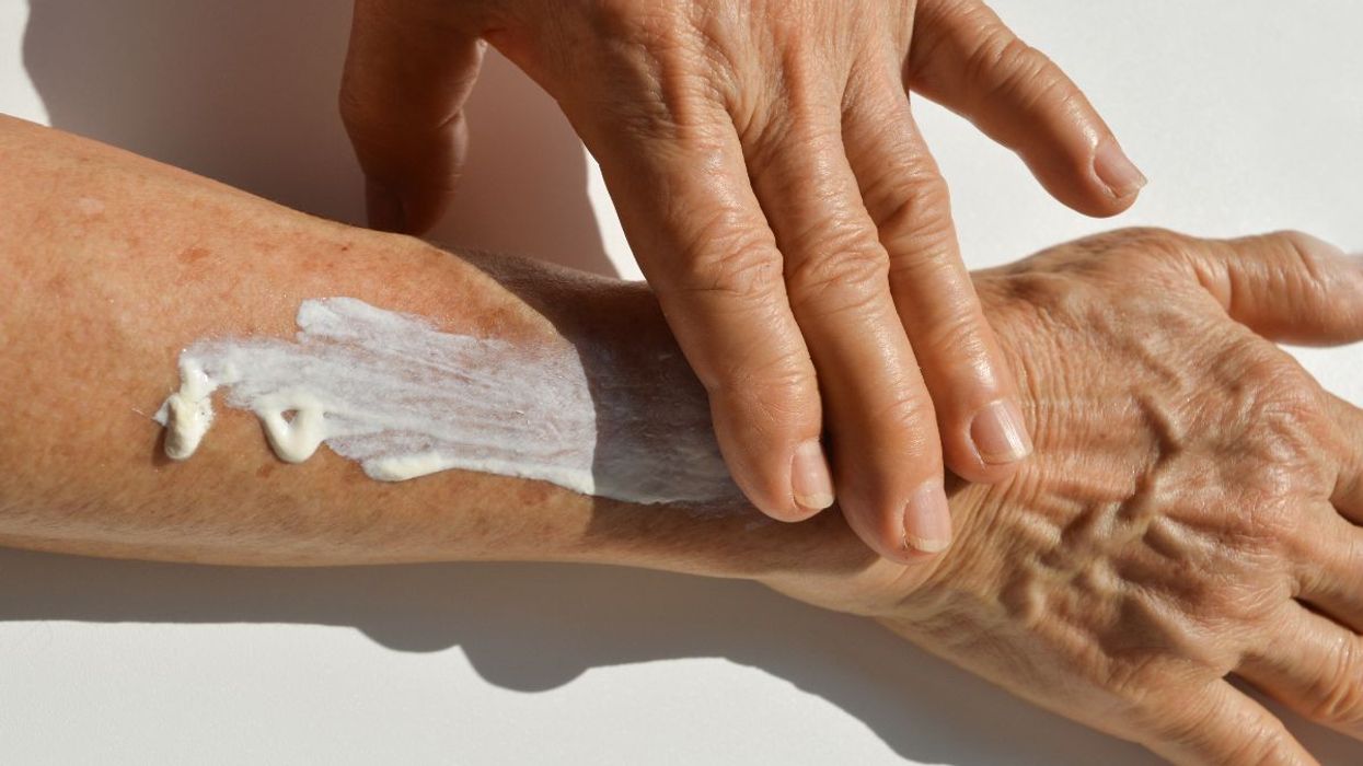 woman applying skin care