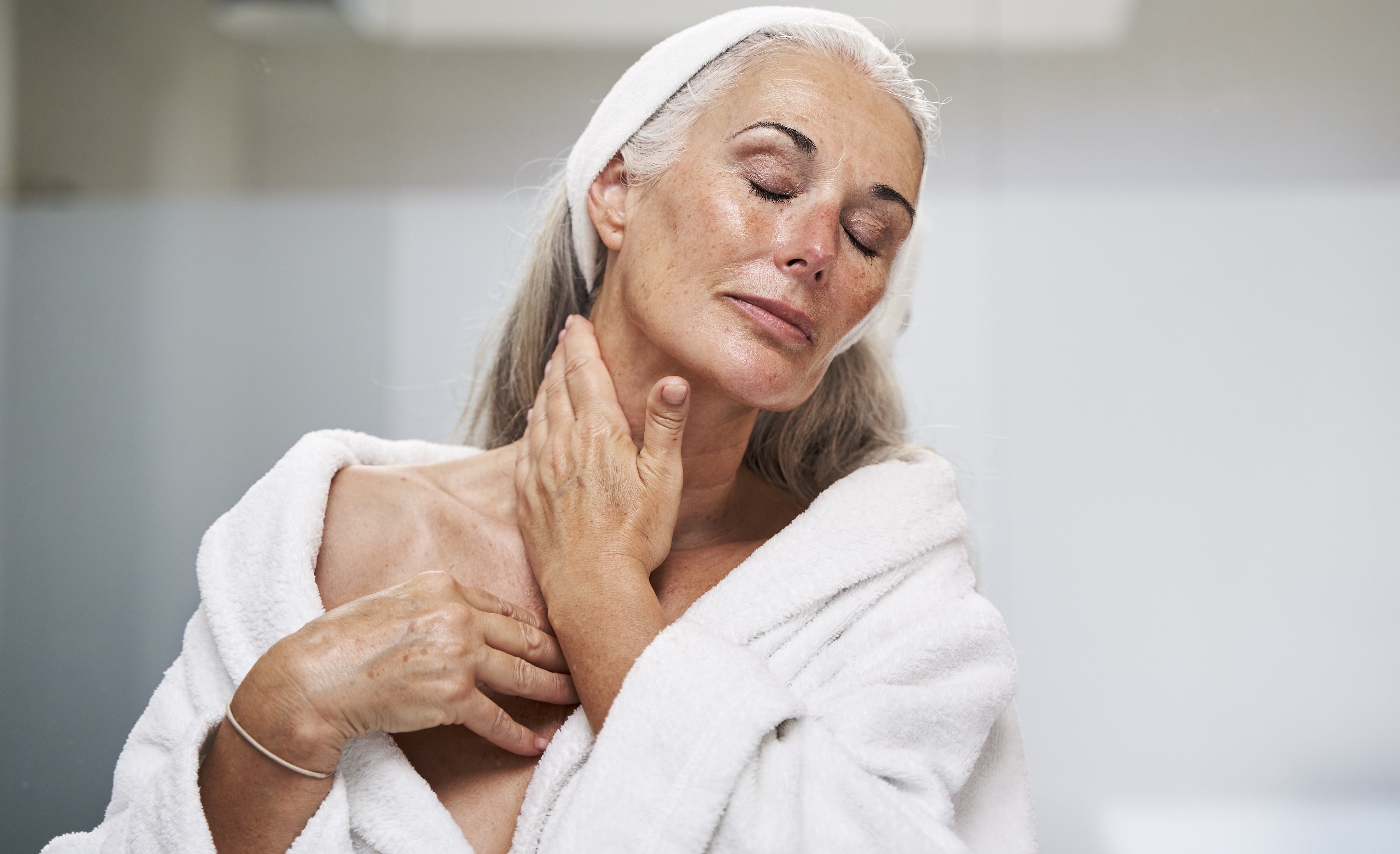 woman applying skin care