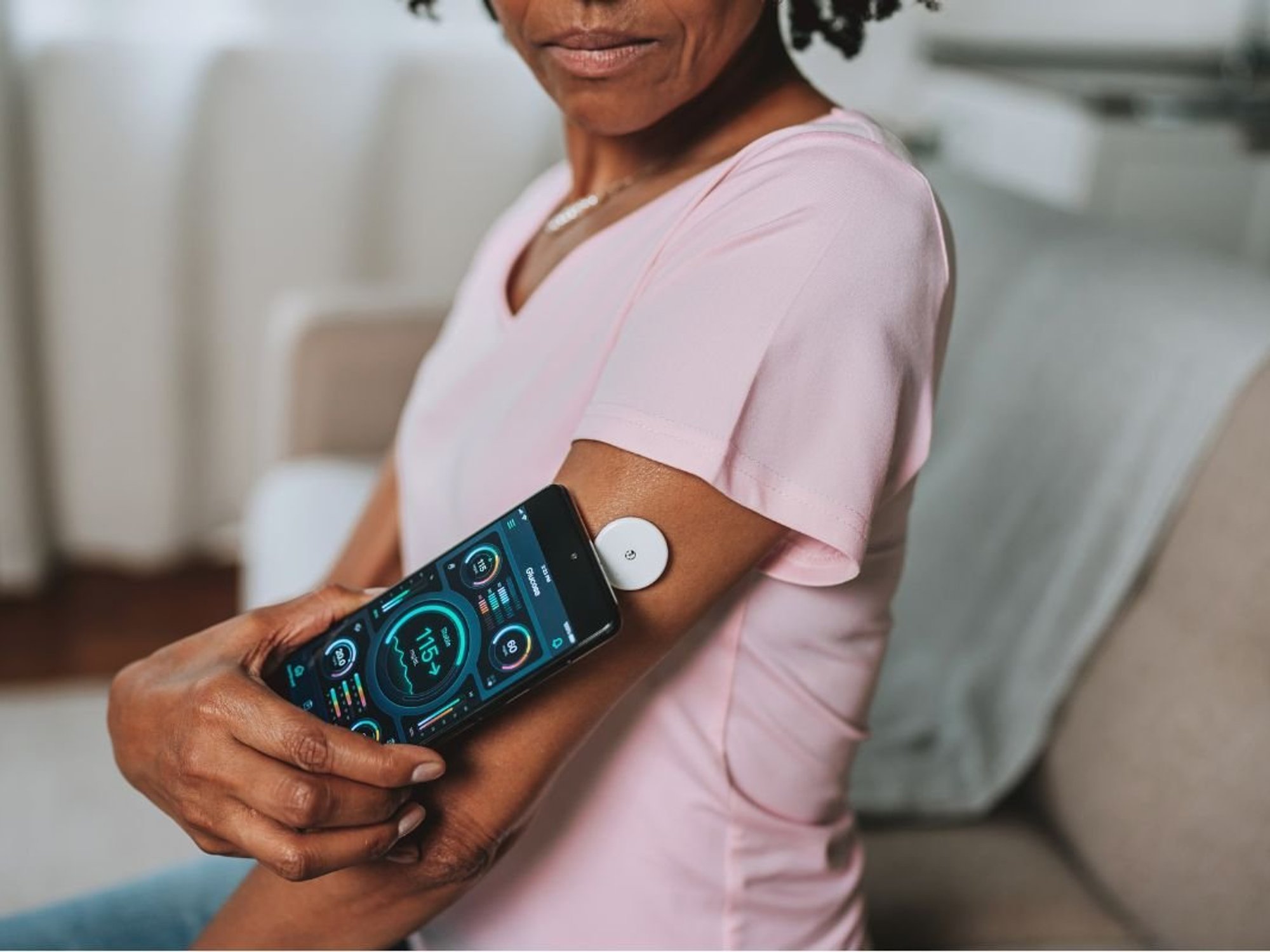 WOMAN BLOOD GLUCOSE MONITOR
