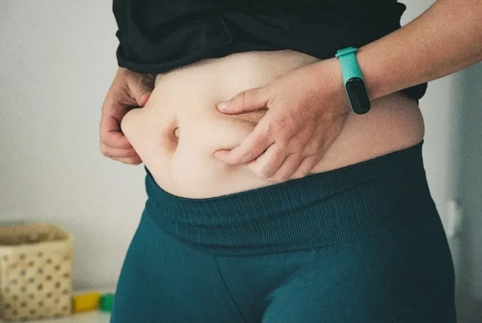 Woman checking her weight