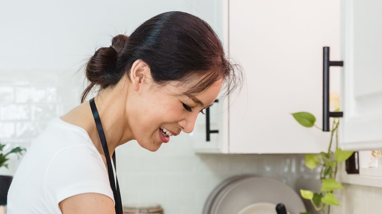 Woman cleaning sink