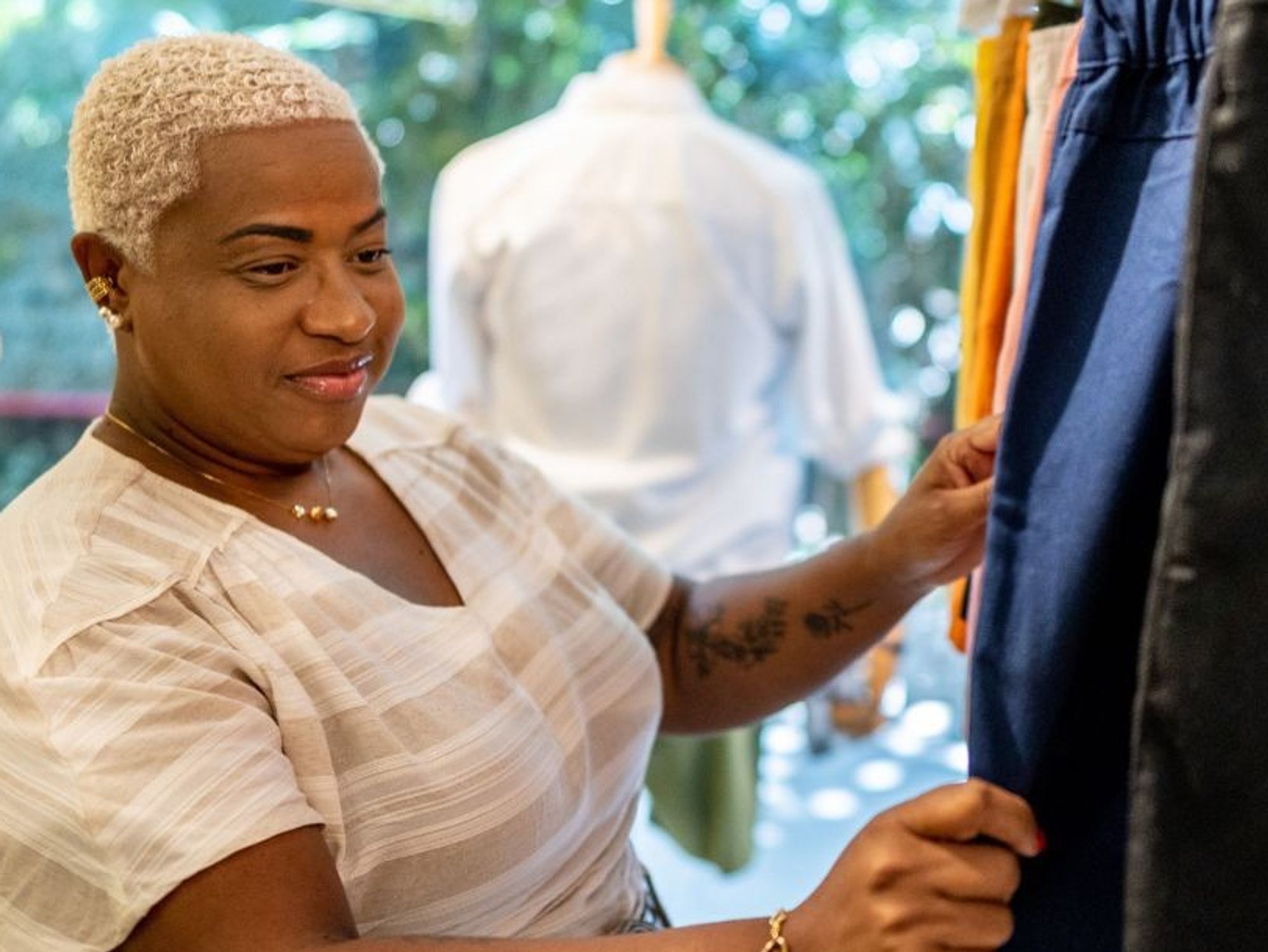 Woman clothes shopping for skirts / Woman wearing long skirt