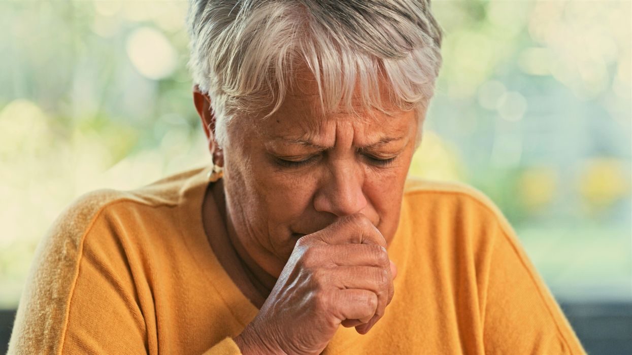 Woman coughing