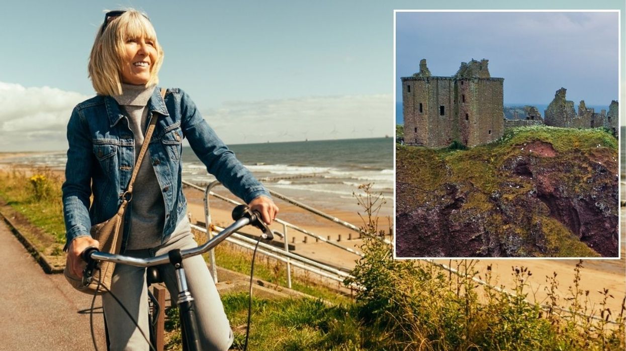 Woman cycling along esplanade in Aberdeen / Dunnottar castle