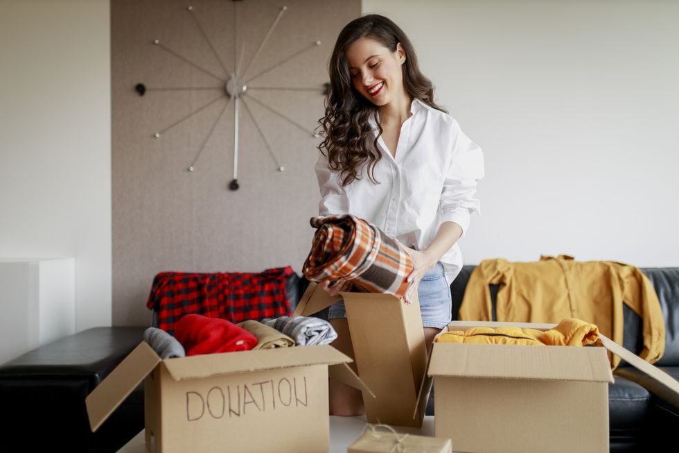 Woman decluttering her home