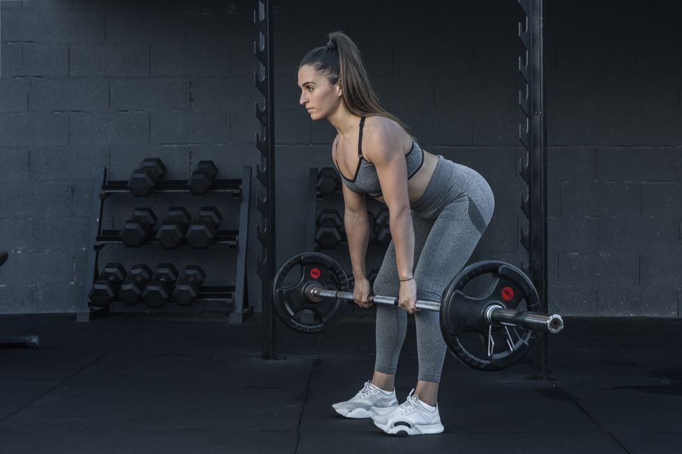 Woman doing deadlifts