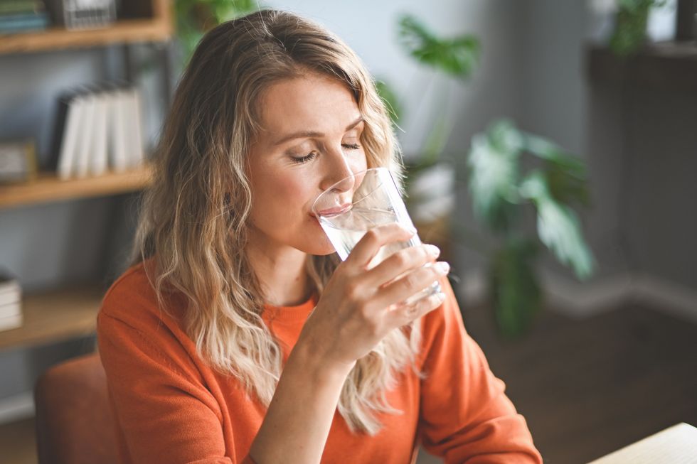 Woman drinking a glass of water