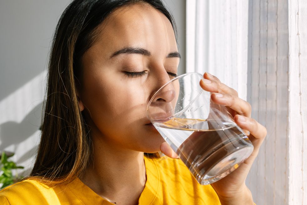 Woman drinking a glass of water