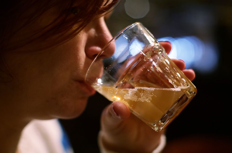 Woman drinking alcohol