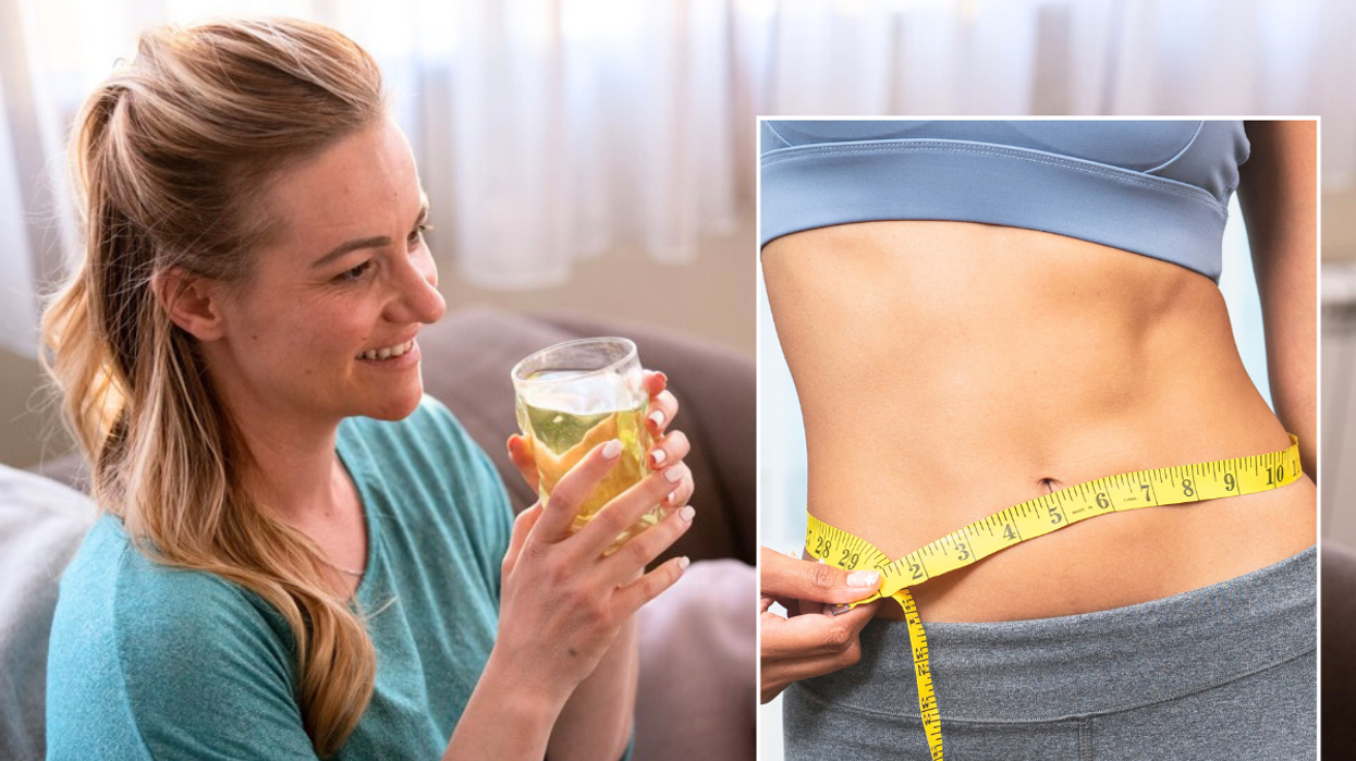 Woman drinking apple cider vinegar / woman's abs